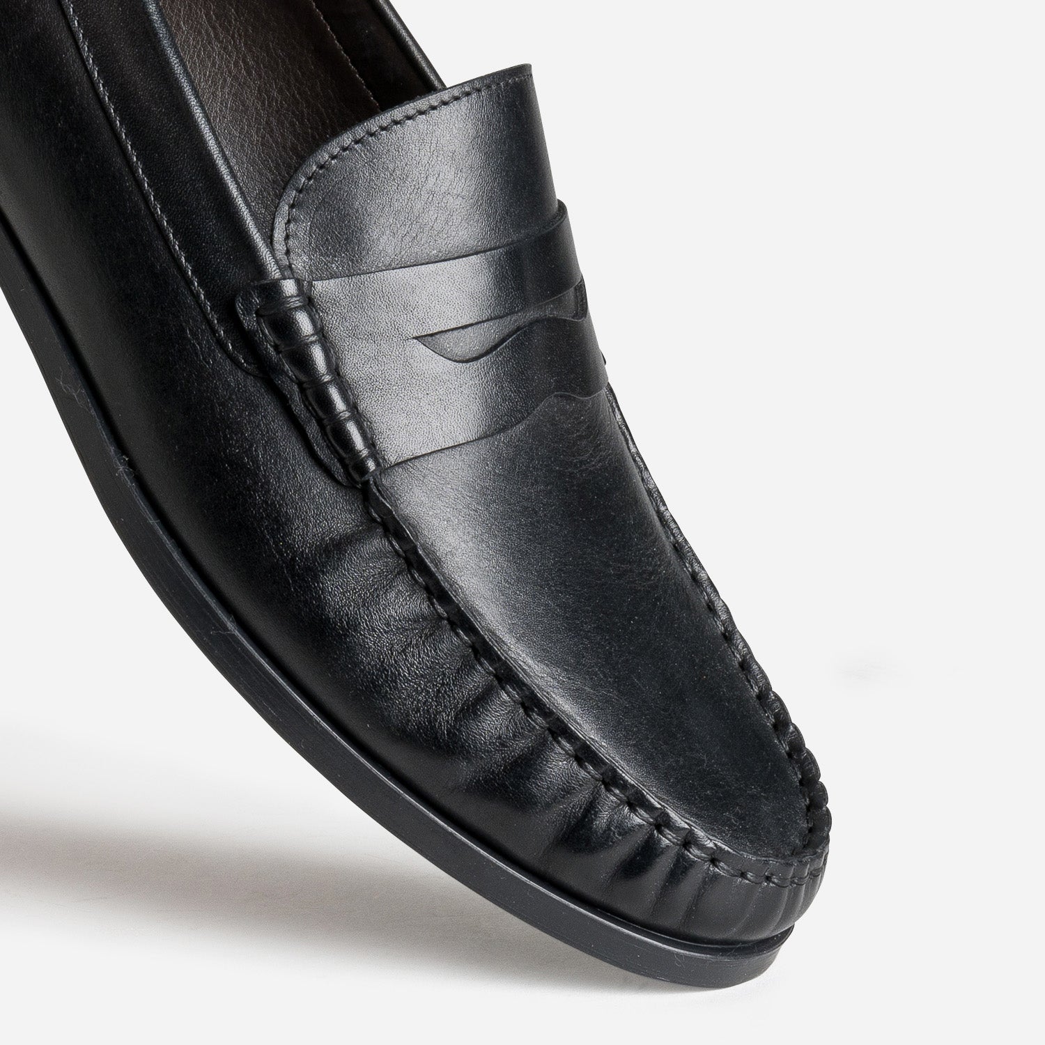 Black leather moccasins top